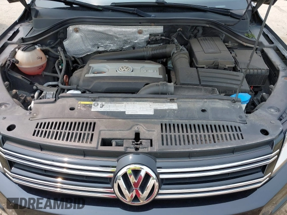 2013 Volkswagen Tiguan S with VIN WVGAV3AX2DW594334, listed as a IAAI auction lot 42405989 with 96,559 mi miles and . Bid and sale history available at DreamBid. Image 10.