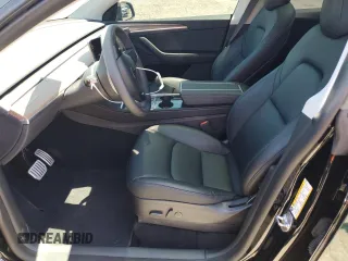 2022 Tesla Model Y Performance z VIN 7SAYGDEF2NF573979, wystawiony jako Copart lot #57778265 z przebiegiem 49 232 mil mil oraz Szkoda całkowita • Salvage title. Historia ofert i sprzedaży dostępna na DreamBid. Obrazek 7.