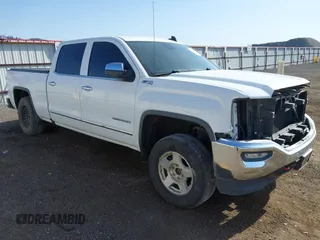 2016 GMC Sierra 1500 SLT with VIN 3GTU2NEC3GG256361, listed as a IAAI auction lot 42126412 with 137,096 mi miles and . Bid and sale history available at DreamBid. Image 1.