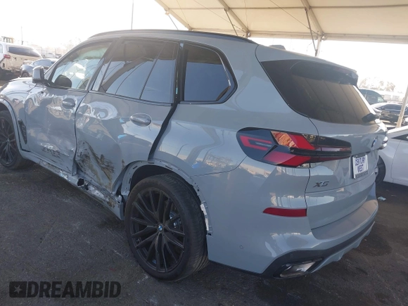 2025 BMW X5 sDrive40i with VIN 5UX13EU06S9Y55088, listed as a IAAI auction lot 41621580 with 1 mi miles. Bid and sale history available at carsss.com. Image 3.
