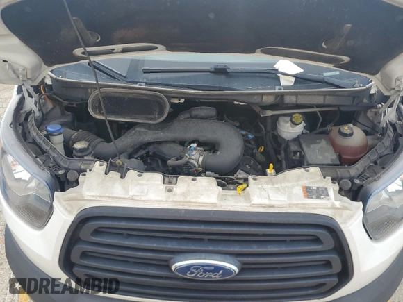 2019 Ford Transit XL с VIN 1FDZX2CM3KKA36815, выставлен на аукционе Copart как лот 66053215 с пробегом 173 978 миль миль и Чистый • Clean title. История ставок и продаж доступна на DreamBid. Изображение 12.