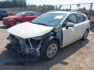 2017 Subaru Impreza Premium z VIN 4S3GTAB61H3718731, wystawiony jako IAAI lot #42520623 z przebiegiem 86 225 mil mil oraz . Historia ofert i sprzedaży dostępna na DreamBid. Obrazek 2.
