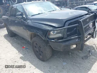 2018 Ram 2500 Laramie with VIN 3C6UR5NLXJG256688, listed as a IAAI auction lot 42168537 with 214,596 mi miles and . Bid and sale history available at DreamBid. Image 1.