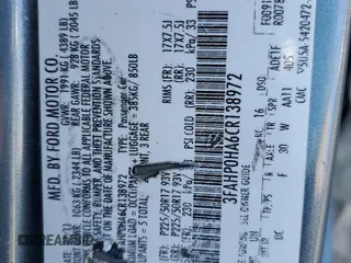 2012 Ford Fusion SE with VIN 3FAHP0HA6CR138972, listed as a Copart auction lot 57448985 with 237,398 mi miles and Salvage title. Bid and sale history available at DreamBid. Image 12.