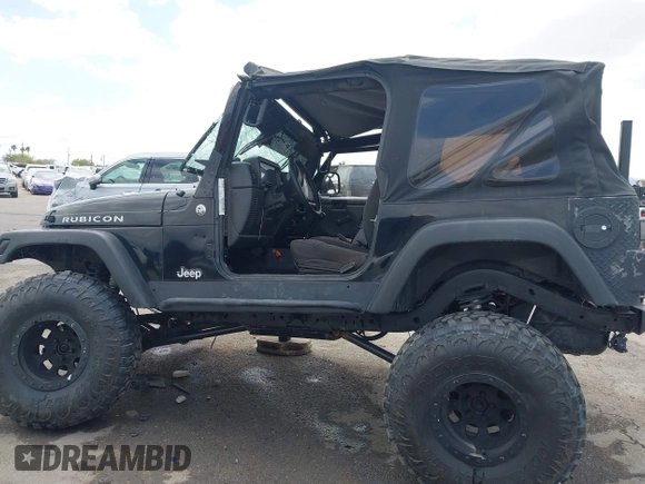 2004 Jeep Wrangler Rubicon z VIN 1J4FA69S84P727716, wystawiony jako IAAI lot #42162129 z przebiegiem 90 844 mil mil oraz . Historia ofert i sprzedaży dostępna na DreamBid. Obrazek 15.