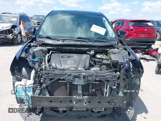 2014 Mazda CX-5 Sport with VIN JM3KE2BE9E0402015, listed as a IAAI auction lot 42098197 with 65,328 mi miles and . Bid and sale history available at carsss.com. Image 6.