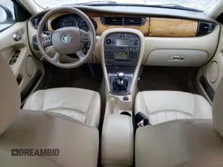 2005 Jaguar X-Type z VIN SAJWB52D95XE23602, wystawiony jako Copart lot #51172275 z przebiegiem 143 550 mil mil oraz Czysty tytuł • Clean title. Historia ofert i sprzedaży dostępna na DreamBid. Obrazek 8.