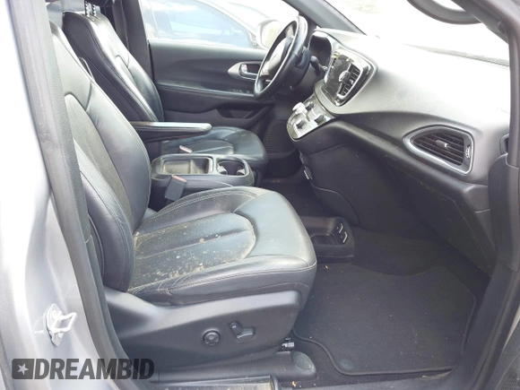 2018 Chrysler Pacifica Touring L with VIN 2C4RC1BG5JR165418, listed as a IAAI auction lot 42143241 with 157,768 mi miles and . Bid and sale history available at DreamBid. Image 5.