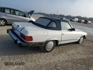 1980 Mercedes-Benz SL with VIN 10704412062529, listed as a Copart auction lot 77941784 with Not provided miles and Salvage title. Bid and sale history available at DreamBid. Image 3.