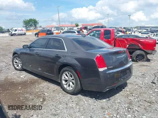 2016 Chrysler 300 Anniversary Edition with VIN 2C3CCAAG7GH135704, listed as a IAAI auction lot 42166589 with 134,955 mi miles and . Bid and sale history available at DreamBid. Image 14.