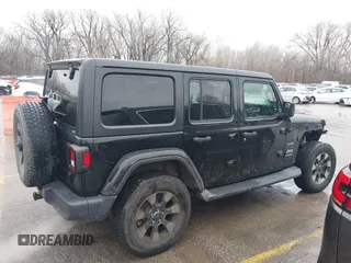 2018 Jeep Wrangler Unlimited Sahara z VIN 1C4HJXEN6JW332956, wystawiony jako IAAI lot #41477681 z przebiegiem 97 446 mil mil oraz . Historia ofert i sprzedaży dostępna na DreamBid. Obrazek 14.