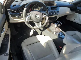 2011 BMW Z4 sDrive30i with VIN WBALM5C57BE162491, listed as a Copart auction lot 47995105 with 97,976 mi miles and Salvage Title. Bid and sale history available at carsss.com. Image 8.