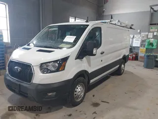 2024 Ford Transit Cargo with VIN 1FTBR2Y83RKA54611, listed as a IAAI auction lot 41349327 with 4,371 mi miles and . Bid and sale history available at DreamBid. Image 2.