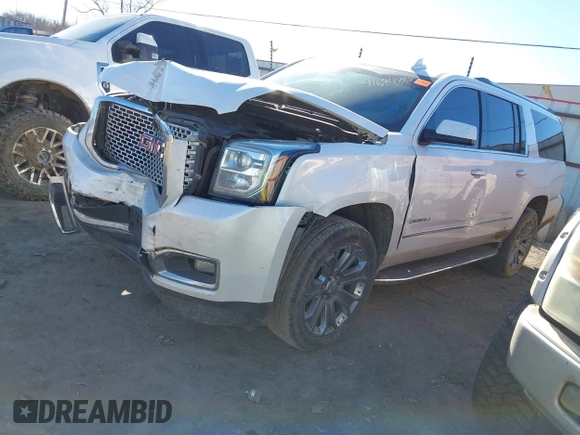2016 GMC Yukon XL Denali with VIN 1GKS1HKJ7GR280505, listed as a IAAI auction lot 41694888 with 218,621 mi miles. Bid and sale history available at carsss.com. Image 2.