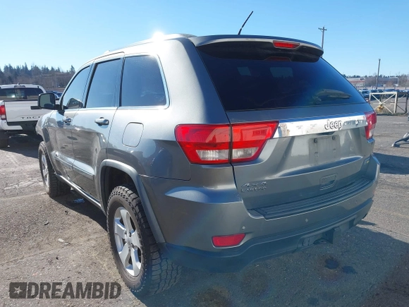 2011 Jeep Grand Cherokee Laredo with VIN 1J4RR4GG9BC714325, listed as a IAAI auction lot 41560915 with 153,372 mi miles and . Bid and sale history available at DreamBid. Image 3.