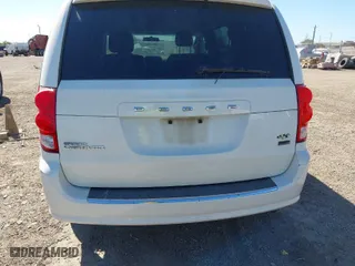 2013 Dodge Grand Caravan SXT with VIN 2C4RDGBG3DR702730, listed as a IAAI auction lot 41818272 with 196,382 mi miles. Bid and sale history available at carsss.com. Image 6.