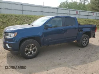 2019 Chevrolet Colorado 4WD Z71 z VIN 1GCGTDEN1K1104026, wystawiony jako Copart lot #59097905 z przebiegiem 76 965 mil mil oraz Czysty tytuł • Clean title. Historia ofert i sprzedaży dostępna na DreamBid. Obrazek 1.