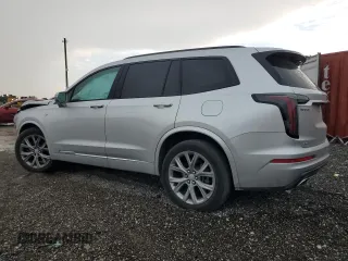 2020 Cadillac XT6 AWD Sport with VIN 1GYKPGRSXLZ217891, listed as a Copart auction lot 67915354 with 34,143 mi miles and Salvage Title. Bid and sale history available at carsss.com. Image 2.