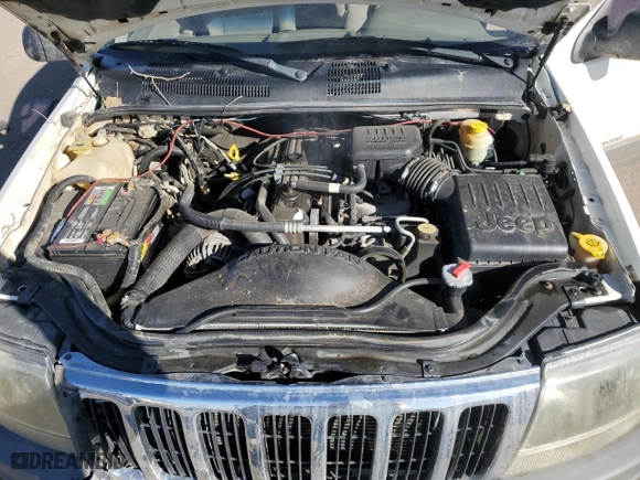 2002 Jeep Grand Cherokee Laredo with VIN 1J4GW48S72C298133, listed as a Copart auction lot 43973315 with 266,437 mi miles and Salvage Title. Bid and sale history available at carsss.com. Image 12.