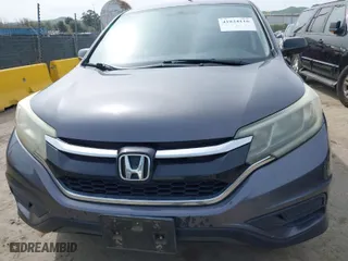 2015 Honda CR-V LX with VIN 3CZRM3H32FG702573, listed as a IAAI auction lot 41824116 with 266,847 mi miles. Bid and sale history available at carsss.com. Image 6.