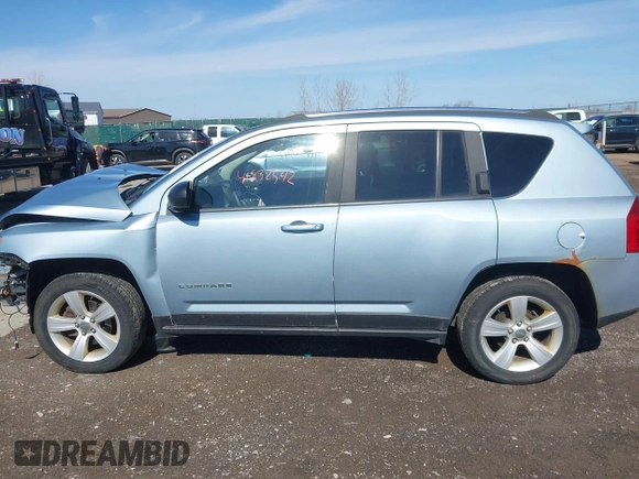 2013 Jeep Compass Latitude with VIN 1C4NJDEB2DD263920, listed as a IAAI auction lot 41832542 with 128,018 mi miles. Bid and sale history available at carsss.com. Image 14.