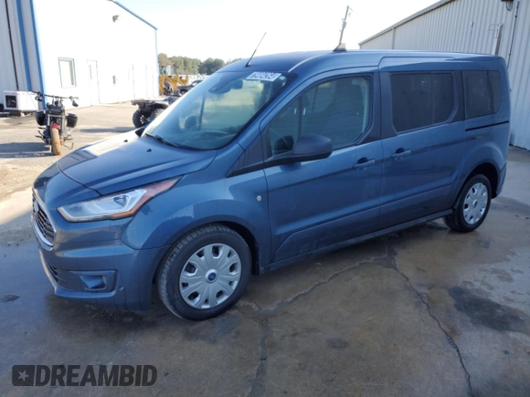 2022 Ford Transit Connect XLT with VIN NM0GS9F21N1509938, listed as a Copart auction lot 79404264 with 103,223 mi miles and Clean title. Bid and sale history available at DreamBid. Image 1.
