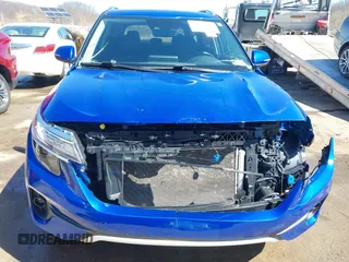 2021 Kia Seltos EX with VIN KNDERCAAXM7167273, listed as a IAAI auction lot 41839652 with 64,256 mi miles and . Bid and sale history available at DreamBid. Image 6.