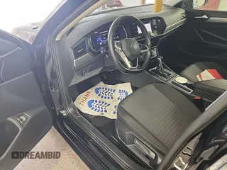 2024 Volkswagen Jetta S with VIN 3VW5M7BU5RM054436, listed as a IAAI auction lot 42766972 with 22,381 mi miles and . Bid and sale history available at DreamBid. Image 3.