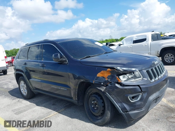 2014 Jeep Grand Cherokee Laredo with VIN 1C4RJEAG0EC179563, listed as a IAAI auction lot 39799427 with 209,169 mi miles and . Bid and sale history available at DreamBid. Image 6.