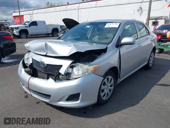 2009 Toyota Corolla with VIN JTDBL40E59J051651, listed as a IAAI auction lot 41874710 with 52,938 mi miles. Bid and sale history available at carsss.com. Image 17.