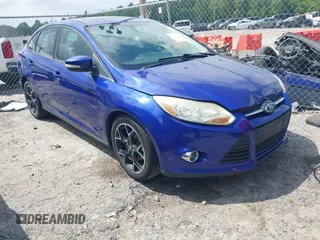 2013 Ford Focus SE z VIN 1FADP3F23DL124510, wystawiony jako IAAI lot #42123819 z przebiegiem 118 723 mil mil oraz . Historia ofert i sprzedaży dostępna na DreamBid. Obrazek 1.