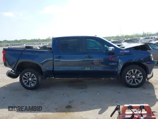 2021 Chevrolet Silverado 1500 LT z VIN 3GCUYDEDXMG111217, wystawiony jako IAAI lot #42056447 z przebiegiem 80 615 mil mil oraz . Historia ofert i sprzedaży dostępna na DreamBid. Obrazek 13.