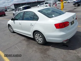 2014 Volkswagen Jetta Sedan S with VIN 3VW2K7AJ6EM334635, listed as a IAAI auction lot 42151738 with 142,923 mi miles. Bid and sale history available at carsss.com. Image 3.