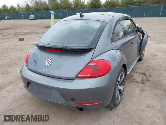 2012 Volkswagen Beetle with VIN 3VWV67AT0CM663718, listed as a IAAI auction lot 41860510 with 99,932 mi miles and . Bid and sale history available at DreamBid. Image 4.