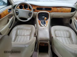 1998 Jaguar XJ with VIN SAJHX6243WC827873, listed as a Copart auction lot 78366904 with Not provided miles and Salvage title. Bid and sale history available at DreamBid. Image 8.