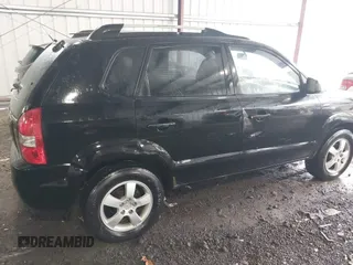 2005 Hyundai Tucson GL with VIN KM8JM12B75U072080, listed as a IAAI auction lot 41779464 with 191,771 mi miles. Bid and sale history available at carsss.com. Image 6.