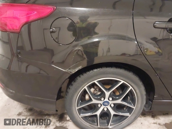 2015 Ford Focus SE with VIN 1FADP3F24FL255450, listed as a IAAI auction lot 41673301 with 103,650 mi miles. Bid and sale history available at carsss.com. Image 19.