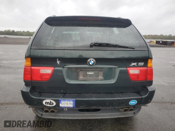 2003 BMW X5 4.4i with VIN 5UXFB33523LH41641, listed as a Copart auction lot 73943304 with 74,753 mi miles and Clean Title. Bid and sale history available at carsss.com. Image 6.