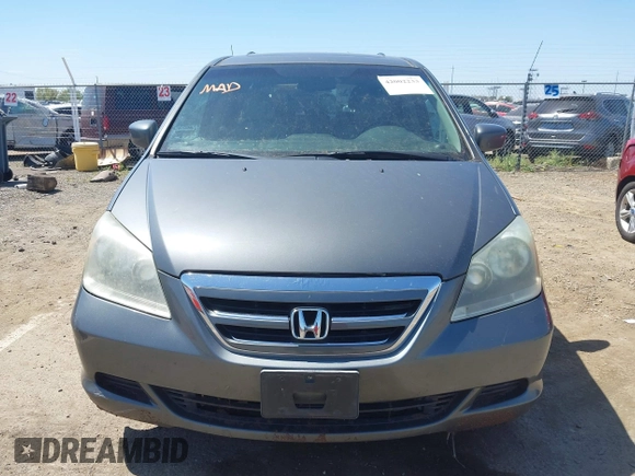 2007 Honda Odyssey EX-L z VIN 5FNRL38797B137595, wystawiony jako IAAI lot #42002233 z przebiegiem 192 296 mil mil oraz . Historia ofert i sprzedaży dostępna na DreamBid. Obrazek 12.