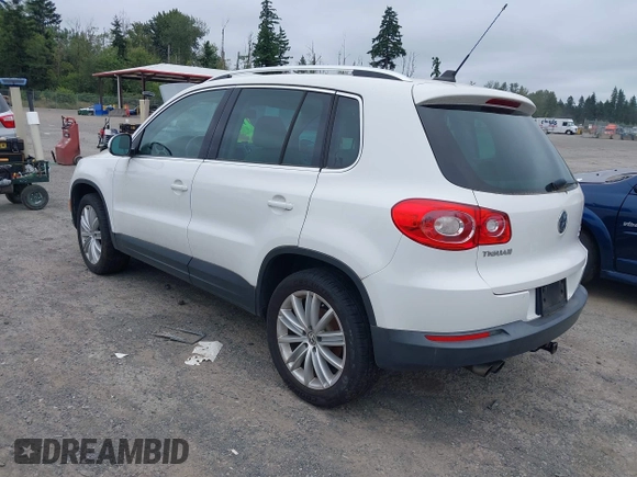 2010 Volkswagen Tiguan with VIN WVGBV9AX2AW513478, listed as a IAAI auction lot 42607466 with 63,780 mi miles and . Bid and sale history available at DreamBid. Image 3.