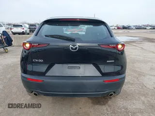 2021 Mazda CX-30 2.5 S with VIN 3MVDMAAL2MM303321, listed as a IAAI auction lot 41583346 with 57,122 mi miles. Bid and sale history available at carsss.com. Image 16.