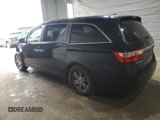 2012 Honda Odyssey EX-L with VIN 5FNRL5H6XCB100522, listed as a Copart auction lot 51431335 with 113,889 mi miles and Salvage Title. Bid and sale history available at DreamBid. Image 2.