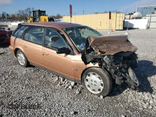1997 Saturn SW z VIN 1G8ZK8277VZ172310, wystawiony jako Copart lot #51969125 z przebiegiem 222 057 mil mil oraz Szkody całkowita. Historia ofert i sprzedaży dostępna na DreamBid. Obrazek 4.
