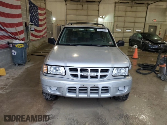 2000 Isuzu Rodeo z VIN 4S2DM58WXY4346884, wystawiony jako Copart lot #43108675 z przebiegiem 144 306 mil mil oraz Nie do naprawy. Historia ofert i sprzedaży dostępna na DreamBid. Obrazek 5.