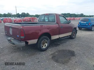 1997 Ford F-150 with VIN 1FTDF1720VNB30982, listed as a IAAI auction lot 42764577 with 296,424 mi miles and . Bid and sale history available at DreamBid. Image 4.