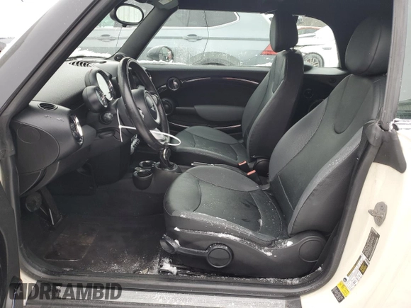 2010 MINI Convertible with VIN WMWMR3C50ATU97287, listed as a Copart auction lot 89116615 with 120,323 mi miles and Salvage Title. Bid and sale history available at DreamBid. Image 7.