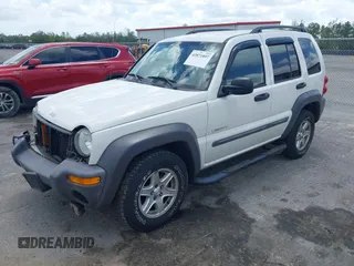2004 Jeep Liberty Sport with VIN 1J4GK48K54W153217, listed as a IAAI auction lot 42071897 with 106,921 mi miles and . Bid and sale history available at carsss.com. Image 2.
