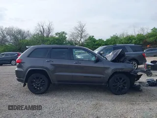 2018 Jeep Grand Cherokee Laredo E with VIN 1C4RJFAG0JC120383, listed as a IAAI auction lot 42115098 with Not Provided miles and . Bid and sale history available at DreamBid. Image 14.