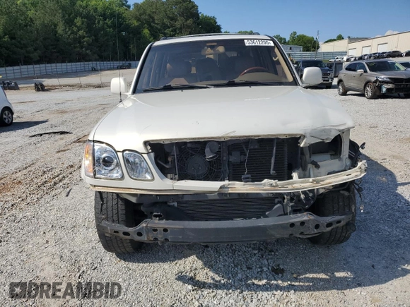 1999 Lexus LX 470 z VIN JT6HT00W1X0074382, wystawiony jako Copart lot #53612205 z przebiegiem 256 689 mil mil oraz Szkoda całkowita • Salvage title. Historia ofert i sprzedaży dostępna na DreamBid. Obrazek 5.