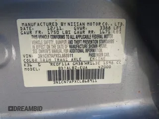 2012 Nissan Versa S with VIN 3N1CN7APXCL868911, listed as a IAAI auction lot 41762670 with 228,177 mi miles. Bid and sale history available at carsss.com. Image 9.